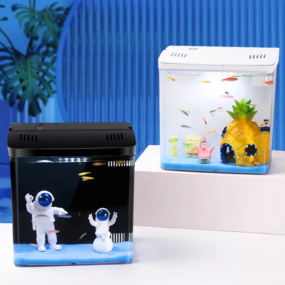 Two fish tanks with decorative elements; one has astronauts and the other has cartoon characters.